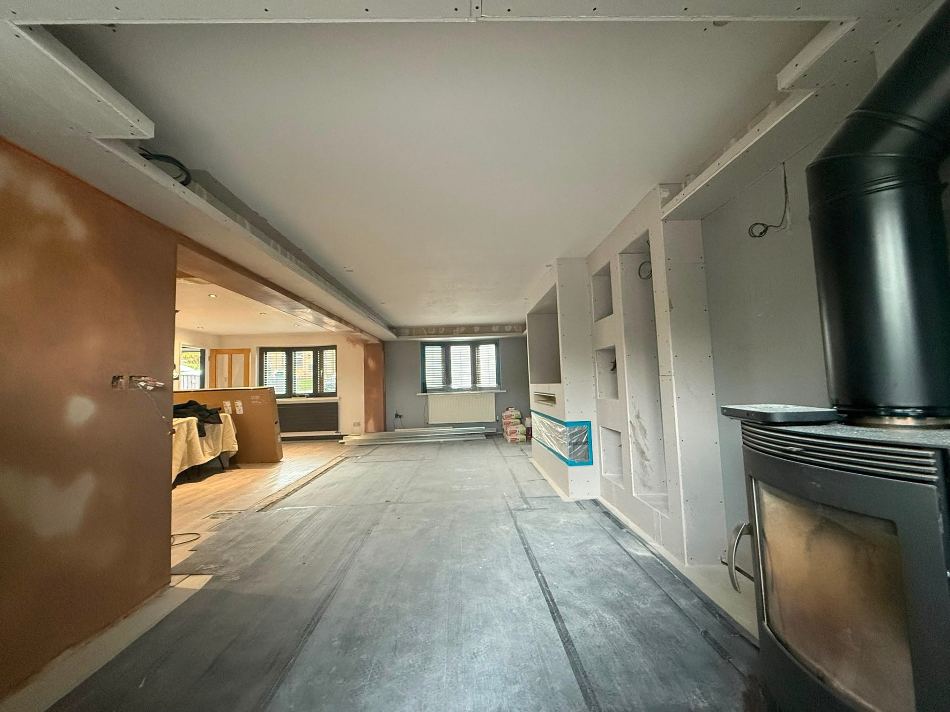 Large interior room with newly installed plasterboard partitioning ready for skimming
